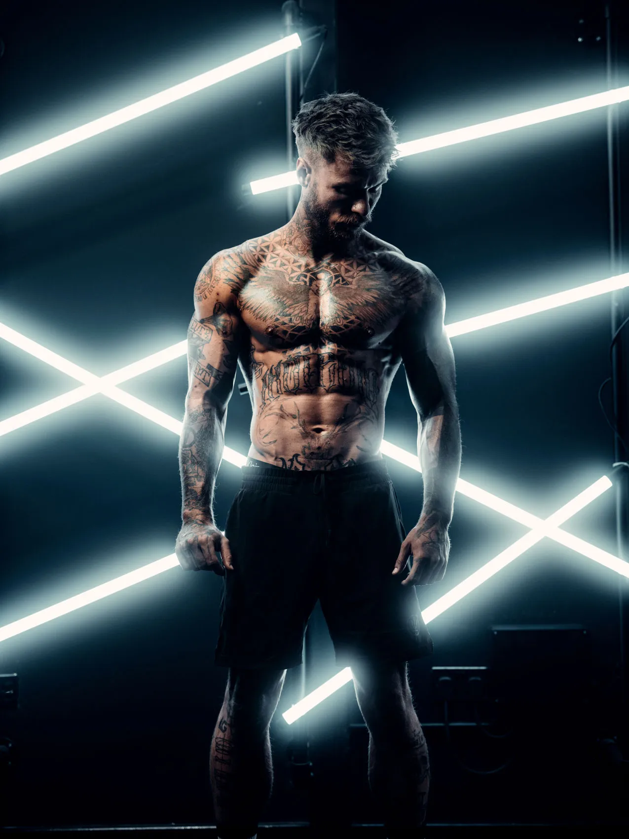 Fitness photography with dramatic lighting by Fitness Growth Agency